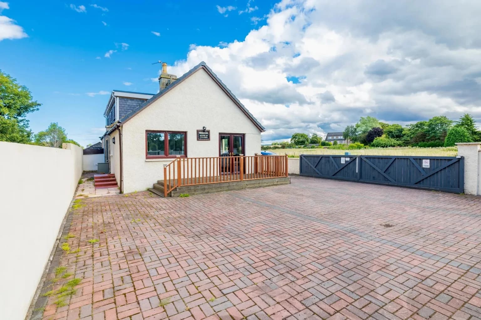 Free gated driveway parking with room for a work van at Mardon Holiday Home, contractor accommodation near Inverness