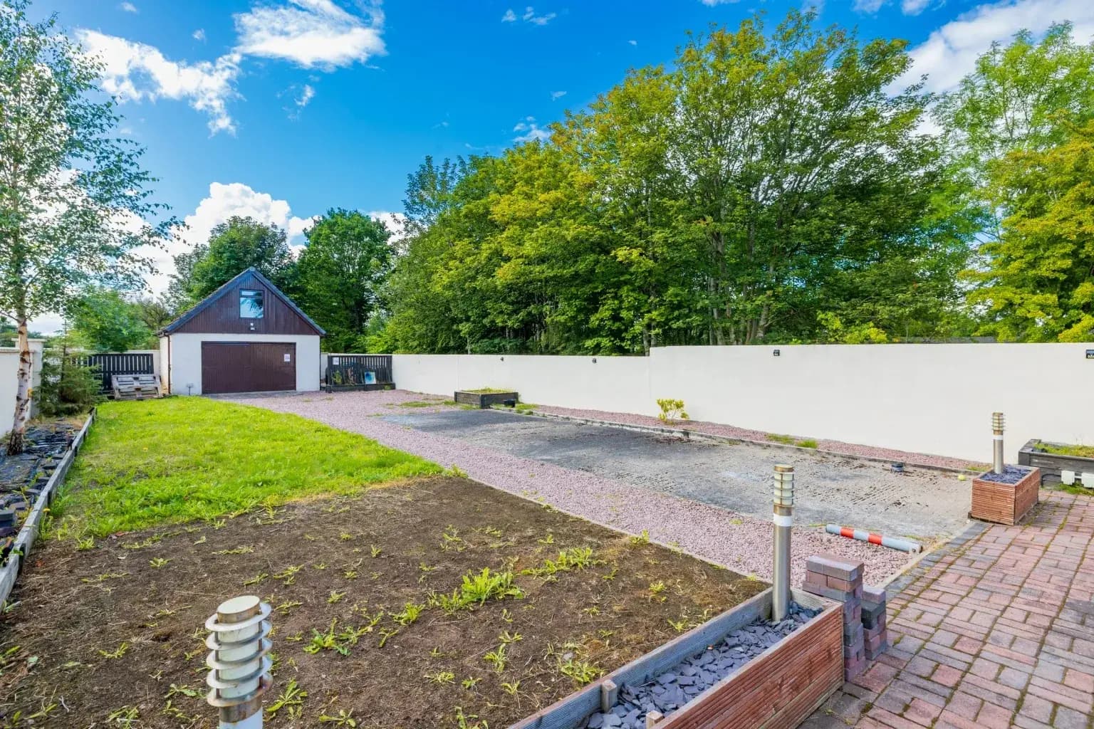 Enclosed private garden at Mardon Holiday Home, family self-catering accommodation in Milton of Culloden near Inverness