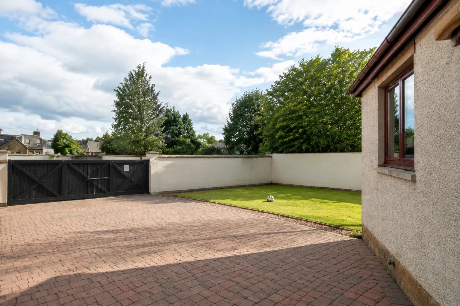 Enclosed private garden at Mardon Holiday Home, family accommodation near Inverness