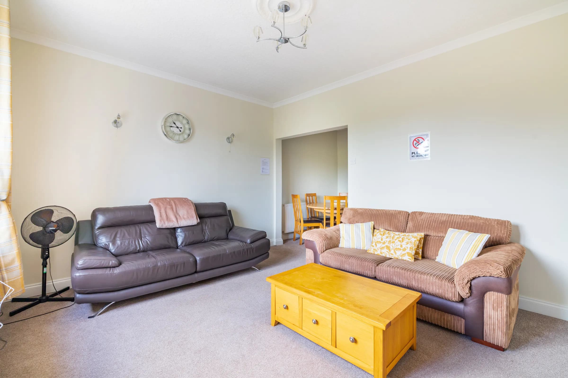 Main House living room – Mardon Holiday Home Main House living room with sofa bed, part of Mardon Holiday Home's self-catering accommodation near Inverness Airport